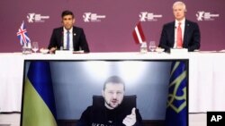 烏克蘭總統澤連斯基2022年12月19日通過視頻在聯合遠征軍會議上講話。