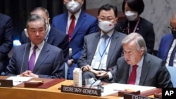 中國外交部長王毅和聯合國秘書長古鐵雷斯