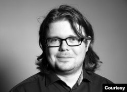 德國對外關係委員會的研究員蒂姆-呂利希