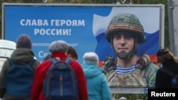 俄羅斯聖彼得堡一面宣傳俄軍士兵的標語牌。(2022年9月21日)