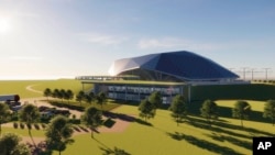 英国劳斯莱斯SMR公司设计的小型模组化反应堆(Small Modular Reactor, SMRs)入口处想象图。该公司2022年9月9日开始为此设想做公关并希望本年代底他们的设想能变成现实。（美联社照片）