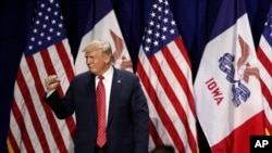 President Donald Trump acknowledges supporters after speaking at the Republican Party of Iowa's America First Dinner, June 11, 2019, in West Des Moines. 