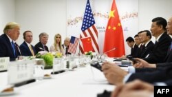 2019年6月29日特朗普与中国国家主席习近平在大阪举行的G20峰会期间举行双边会谈。