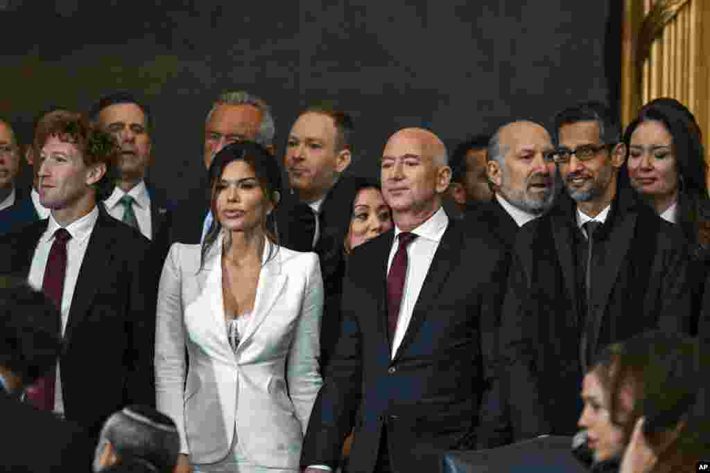 Mark Zuckerberg, from left, Lauren Sanchez, Jeff Bezos and Sundar Pichai stand before the 60th Presidential Inauguration in the Rotunda of the U.S. Capitol in Washington, Jan. 20, 2025.