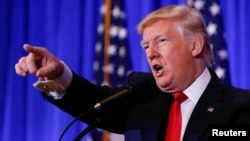 美國當選總統川普1月11日講話資料照。