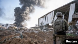 以色列国防部2023年12月19日发表军人在加沙作战的照片。