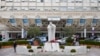 A statue of Pope John Paul II is seen Feb. 17, 2025, in front of the Agostino Gemelli Polyclinic in Rome, where Pope Francis is being treated for a respiratory tract infection.