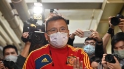 香港記協主席陳朗升正常採訪時遭警方以港版口袋罪逮捕