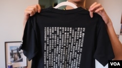 在英國倫敦舉行“抗爭的背後”展覽其中一件展品，國際歌的歌詞。(美國之音/鄭樂捷)