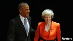 特里莎梅(右)與奧巴馬