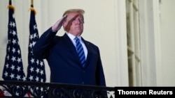 资料照片: 美国总统特朗普从沃尔特·里德国家军事医疗中心返回白宫。(2020年10月5日)