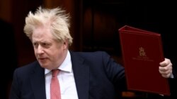 英國首相放棄所有剩餘的新冠限制