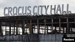 Последствия смертоносного нападения на Московский концертный зал (архивное фото)