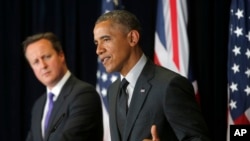 美國總統奧巴馬（右）和英國首相卡梅倫。（資料圖片）