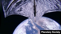 This image was taken during the LightSail 2 sail deployment sequence, July 23, 2019. Baja California and Mexico are visible in the background. LightSail 2's dual 185-degree fisheye lenses can each capture more than half of the sail.