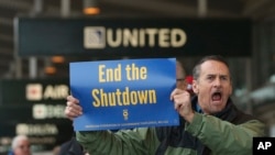 聯邦政府員工呼籲結束政府部分機構關門狀態。