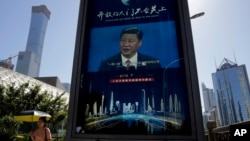 2018年5月30日行人走過北京商務區習近平講話視頻