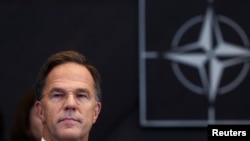 资料照 - 2024 年 10 月 1 日，荷兰前首相马克·吕特在接替延斯·斯托尔滕贝格担任北约秘书长的当天，在比利时布鲁塞尔的北约总部出席北大西洋理事会会议。