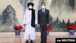 中國外長王毅今年7月在天津會晤塔利班代表