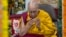 FILE - Tibetan spiritual leader the Dalai Lama presides over a prayer session where a group of Indian devotees prayed for his longevity in Dharamshala, India, Dec. 6, 2024. 