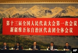 2018年3月13日，中国十三届全国人大一次会议新疆代表团全体会议向媒体开放。 新疆维吾尔自治区主席雪克来提·扎克尔讲话。