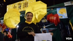 現場報導-香港年宵花市多見「傘落社區」