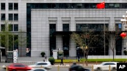 北京的中國商務部門前車如流水（2018年4月6日）。商務部國際貿易經濟合作研究院是中國官方成立的“美國研究智庫聯盟”的一部分。