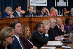 House Judiciary Committee Chairman Jerrold Nadler, D-N.Y., top center, and Rep. Doug Collins, R-Ga., the ranking member, right, makes his opening statement.