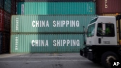 美國喬治亞州一個港口裝卸中國集裝箱（美聯社2018年7月5日）