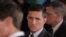 FILE - Then-White House National Security Adviser Michael Flynn, center, arrives at the White House in Washington, Feb. 13, 2017.