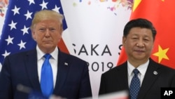 美国总统特朗普与中国国家主席习近平2019年9月29日出席在日本大阪举行的20国集团峰会