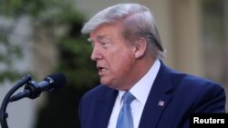 美國總統特朗普在舉行疫情簡報會上發表講話。（2020年4月15日）