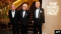 Сигемицу Танака, Теруми Танака и Тошиюки Мимаки на церемонии вручения Нобелевской премии мира. Осло, 10 декабря 2024 г. 