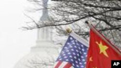 Political prisoners Yan Naing Tun (C) and Aung Min Naing (back C) talk to the media after being released from Insein prison in Rangoon, Burma, Dec. 31, 2013.&nbsp;