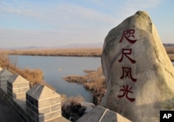 China and N. Korea is divided at the place by a fence