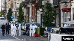 资料照片: 2023年10月17日布鲁塞尔警察枪击现场外工作