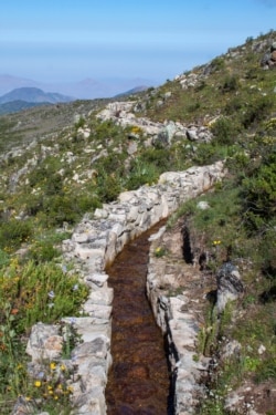 A diversion canal as part of the pre-Inca infiltration system during the wet season. Canals like this divert water during the wet season to zones of high permeability. (M. Briceño, CONDESAN, 2012)