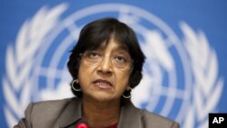 U.N. High Commissioner for Human Rights Navi Pillay addresses a news conference on the situation in Tunisia at the European headquarters of the United Nations in Geneva, January 19, 2011