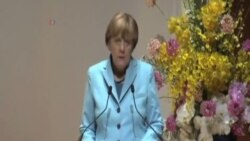 默克爾抵日訪問