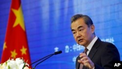 图为中国国务委员兼外长王毅。（2019年5月10日）