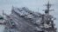 ກຳປັ່ນບັນທຸກເຮືອບິນ USS Carl Vinson ຂອງສະຫະລັດ ເດີນທາງເຖິງຖານທັບເຮືອເກົາຫຼີໃຕ້ ໃນລະຫວ່າງການຢ້ຽມຢາມທ່າເຮືອ Busan ທາງພາກຕາເວັນອອກສຽງໃຕ້ ຂອງນະຄອນ Busan ໃນວັນທີ 2 ມີນາ 2025.