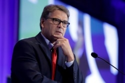 FILE - U.S. Energy Secretary Rick Perry speaks at the California Republican fall convention in Indian Wells, California, Sept. 6, 2019.