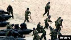 日本自衛隊2014年軍演一景（資料圖片）