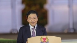李顯龍長達20年執政落幕 新任總理黃循財宣誓就職