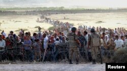 星期四在土耳其邊境附近的21個庫爾德人村莊