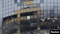 2024 年12 月21 日，位於俄羅斯中部的喀山遭到烏克蘭軍隊的無人機襲擊。圖為被無人機撞擊的一幢多層居民大樓。