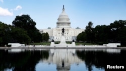 ພາບ​ດ້ານຫຼັງ​ຂອງ​ຫໍ​ລັດ​ຖ​ະ​ສະ​ພາ ສະ​ຫະ​ລັດ, ນະ​ຄອນຫຼວງ ວໍ​ຊິງ​ຕັນ, 20 ກັນ​ຍາ 2024. REUTERS/Piroschka van de Wouw/File Photo/File Photo