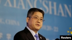 2019年時任中國外交部副部長的樂玉成在北京一個論壇上發表講話。 （資料照片，2019年10月22日）