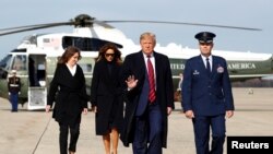 美国总统特朗普11月9日在安德鲁斯联合基地搭乘空军一号前往阿拉巴马州视察前对记者发表讲话。