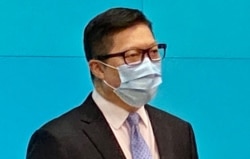 警务处处长邓炳强升任保安局局长，首位警察背景升任政务司司长的李家超，被香港传媒形容为“警察政府” (美国之音汤惠芸）